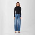 Ash Barrel Leg von Dawn Denim in Medium Blue – Jeans mit Barrel-Silhouette und mittelhohem Bund
